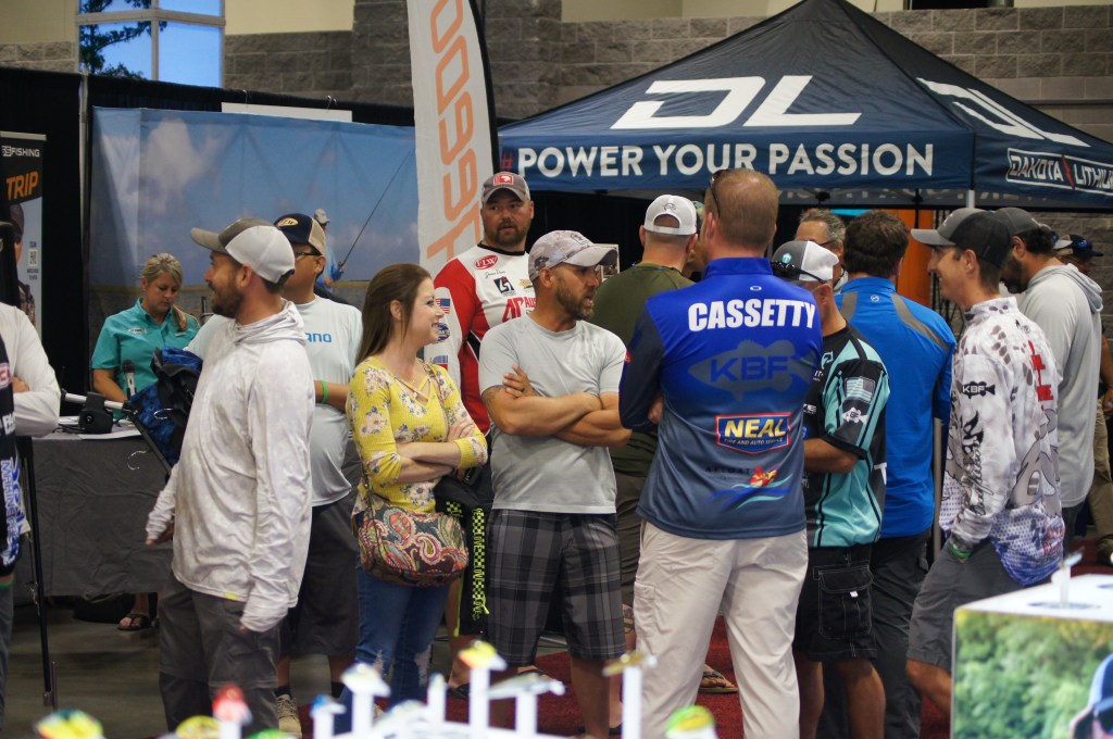 Darrell Cornelius and his wife Tanya talking with some of the anglers